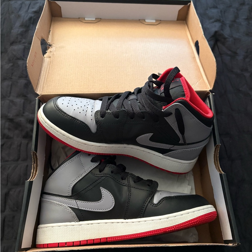 Nike Black and Gray Athletic Shoes with Red Accents